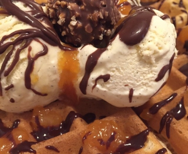 belgium waffel with vanilla ice cream and chocolate